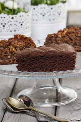 Chocolate cake on grey wooden table