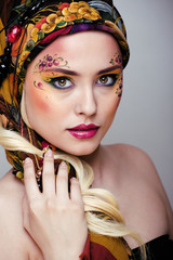 portrait of contemporary noble woman with face art creative close up, new style fashion