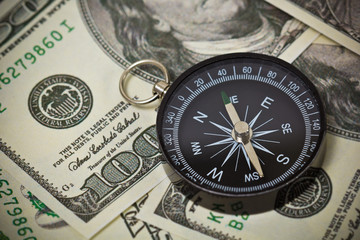 U.S. Dollar currencies with a compass