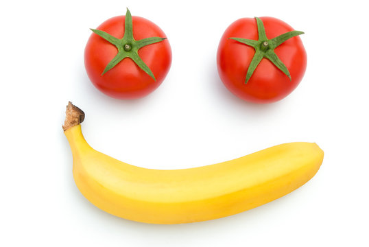 tomatoes and carrot shape like smiling face with clipping path
