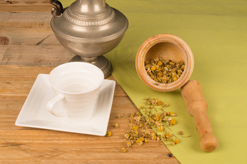 Camomile in mortar