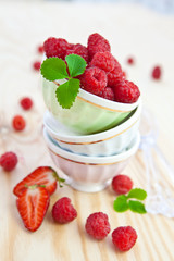 Fresh berries in vintage cups