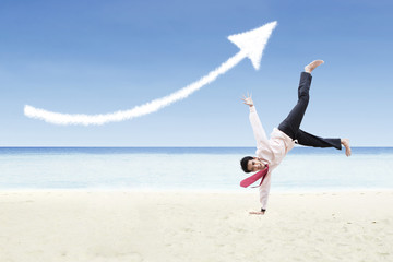 Businessman dance and increase arrow sign cloud at beach