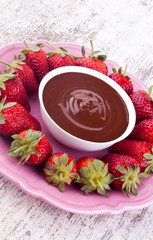 Obraz na płótnie Canvas chocolate fondue and strawberry