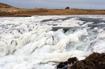 Frozen waterfall in Iceland