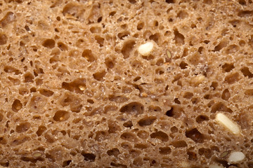 Slice of dark bread isolated over white