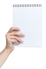 Obraz premium female teen hand holding notebook on a spring