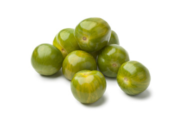 Heap of green yellow tomatoes