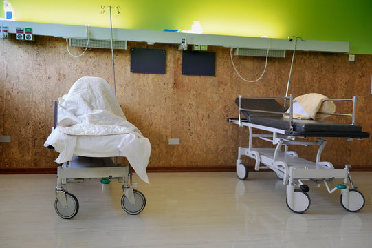 Interior of a hospital room with two empty beds