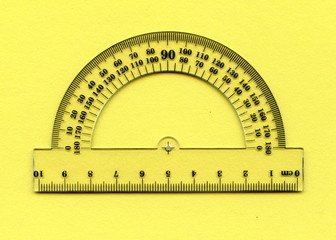 A half circle protractor marked in degrees