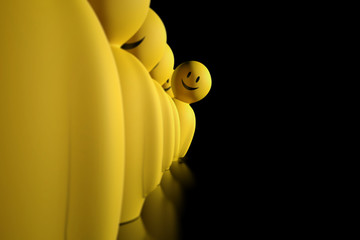 3d yellow stylized character aligned in a row