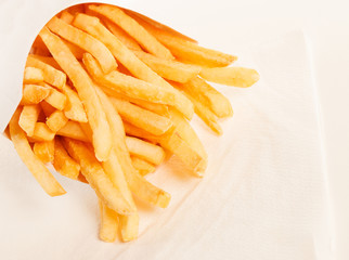 french fries in a paper wrapper