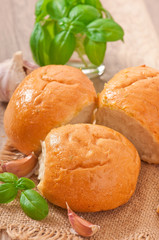 Homemade buns with garlic and green basil