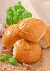 Homemade buns with garlic and green basil