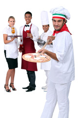 Italian pizza chef and restaurant staff