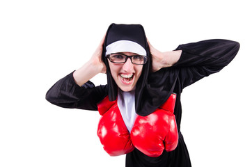 Nun with boxing gloves isolated on white