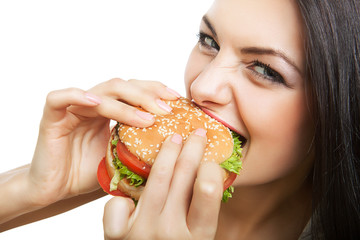 cute girl biting hamburger