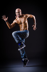 Dancer dancing in the dark studio