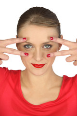 Woman holding her fingers around her eyes