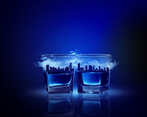 Two glasses of blue liquid