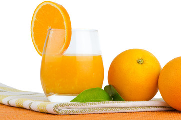 Cup of orange juice and fresh orange