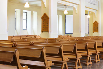Row of wooden benches in Evangelical Lutheran Cathedral