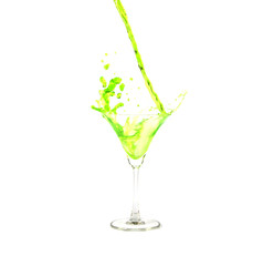 pour the juice into a glass isolated on white background