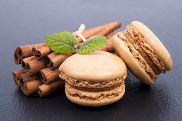 Macaroons with cinnamon sticks