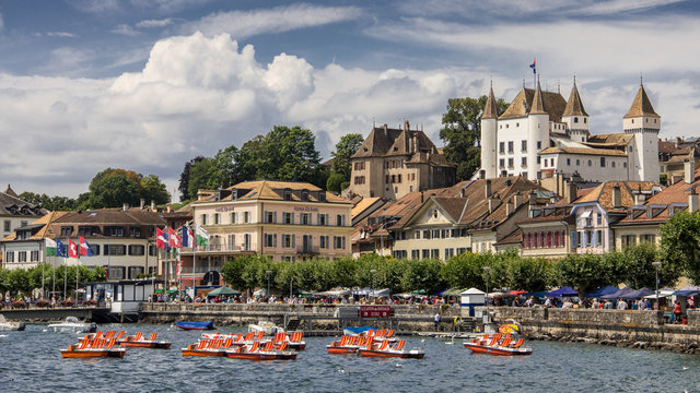 Nyon panorama with pedal boats in Lake Geneva
