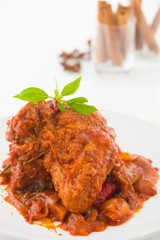 curry chicken, indian cuisine with traditional food items on bac