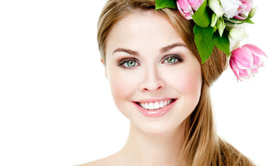 Fototapeta premium Smiling beautiful woman with flowers in her hair