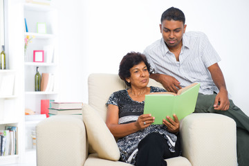 Fototapeta premium indian family reading lifestyle photo