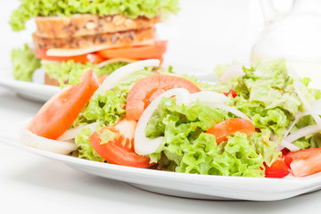 Salad and sandwiches. Selective focus