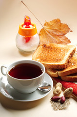 Slice toast bread and cup of tea