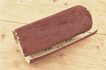 Emery paper - sandpaper on wooden board