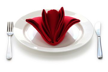folded napkin like a rose bud, table setting