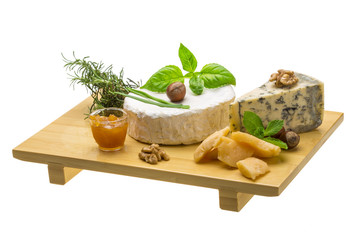 Assorted cheese - brie, dor blue and hard old yellow cheese