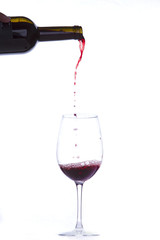 Pouring a glass with red wine