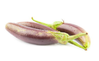 Eggplant purple vegetable closeup on isolated white background