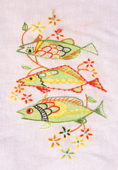 Cloth embroidery of fish.