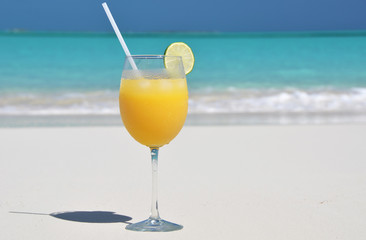 Orange juice on the beach. Exuma, Bahamas