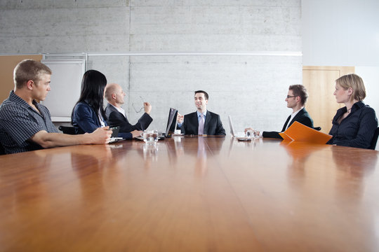 Business team on large conference table