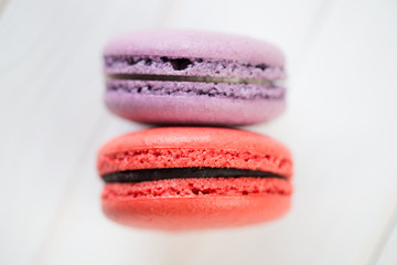 Two macarons with currant and lavender flavour, view from above