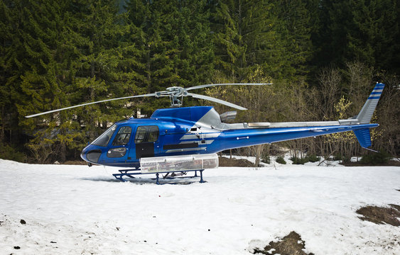 helicopter resting on the snow