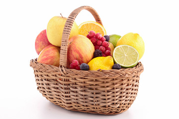 isolated fruits on wicker basket
