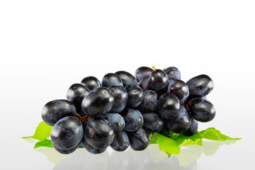 Fresh blue grape fruit on white background