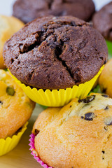Muffins - homemade cupcakes in colorful molds