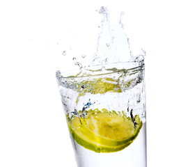 Glass with juice and lemon