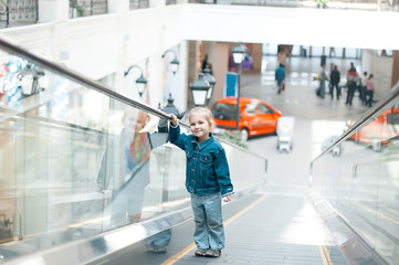 Fototapeta premium little girl walks on Walkway