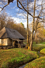 Watermill and creek in the forest